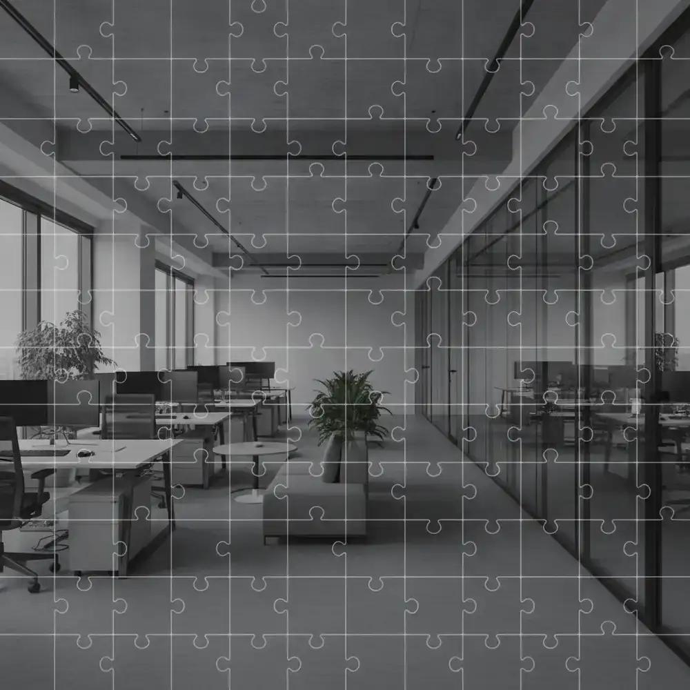 MineGrid Studio office overlaid with puzzle grid elements